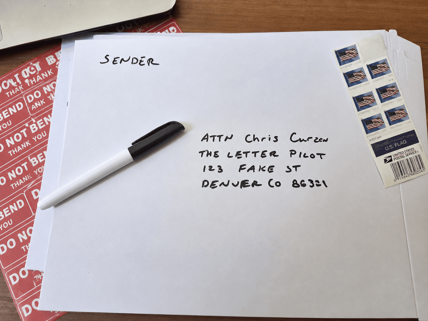 Handwritten envelope addressed to The Letter Pilot for the attention of Chris Curzon