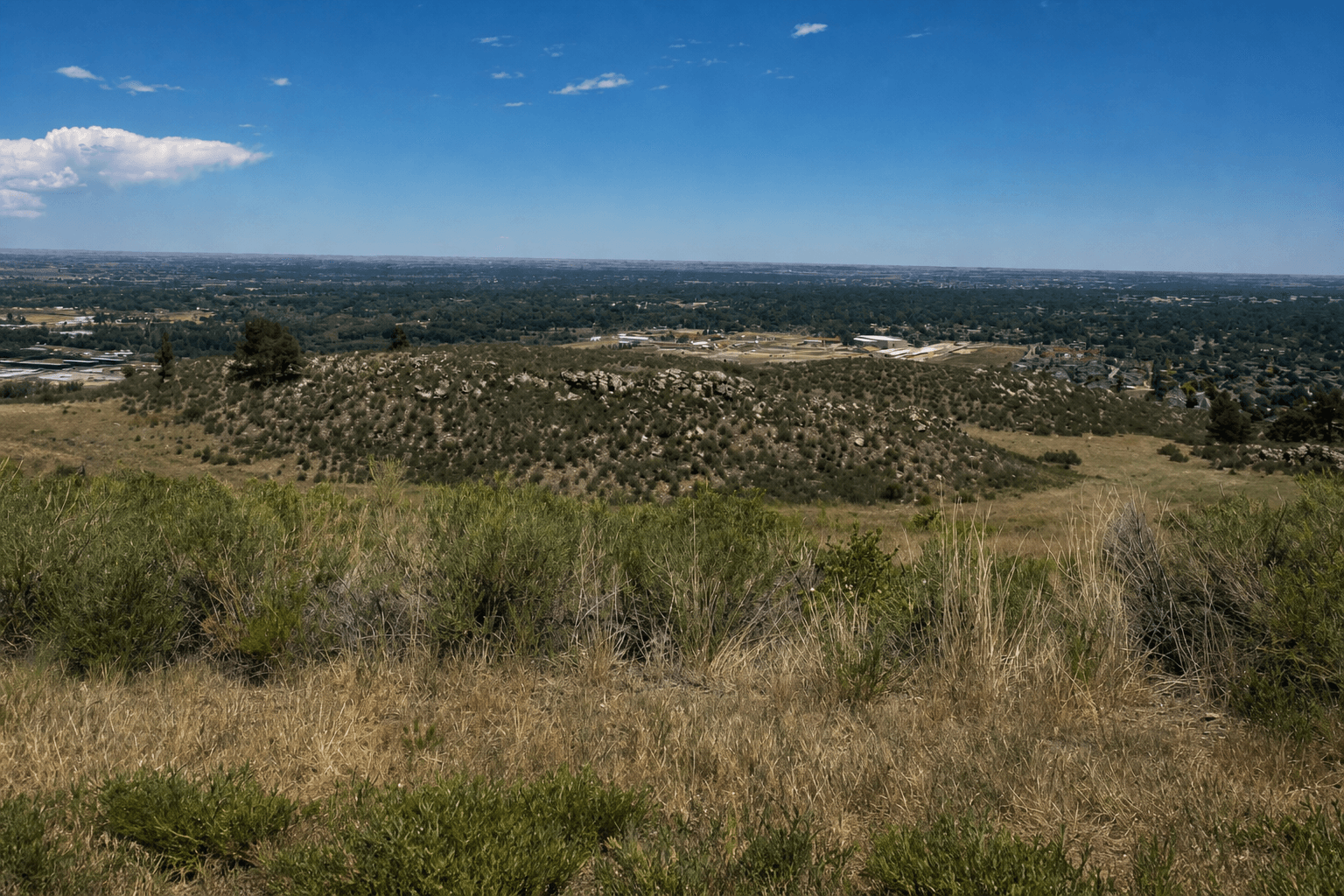 Mountain terrain overlooking a community served by regional roads