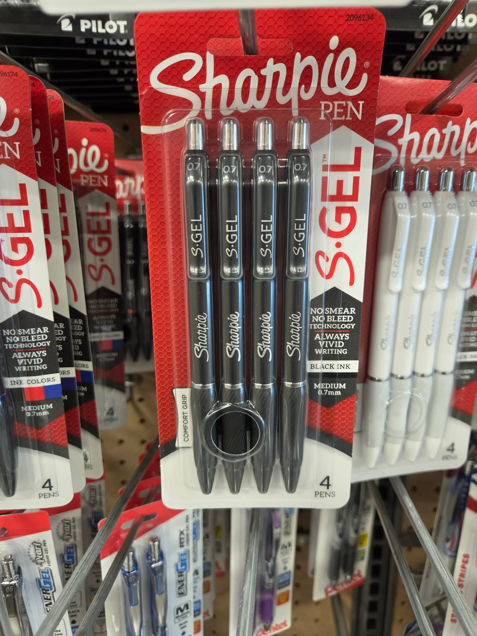Package of black Sharpie S-Gel 0.7 millimeter pens on a store display