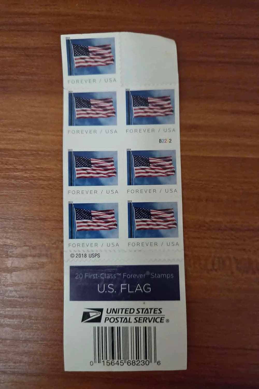 Partially used booklet of USPS U.S. Flag First-Class Mail Forever Stamps
