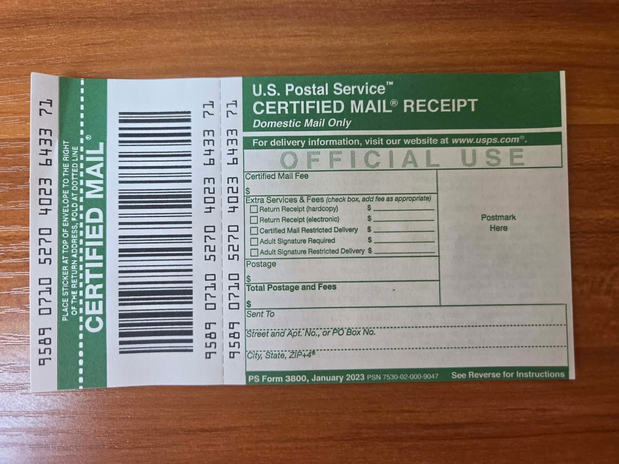 PS Form 3800 Certified Mail receipt showing its tracking number and barcode