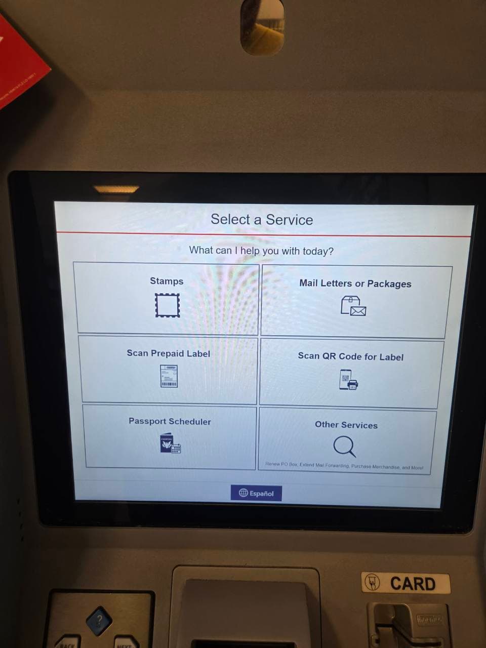 USPS self-service kiosk screen with options to buy stamps or mail letters and packages